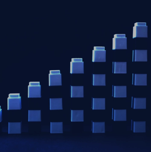 3D bar chart with rising blocks on a dark blue background