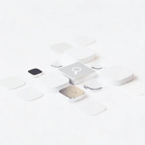 Abstract white tiles with a central magnifying glass icon